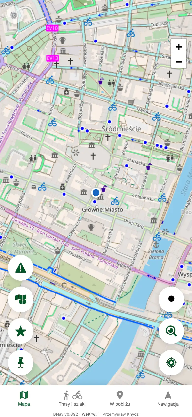 Mapa centrum miasta z niebieską kropką pozycji i przyciskami aplikacji